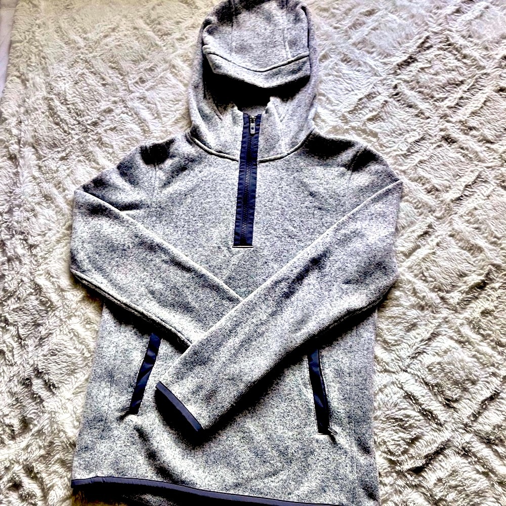 Lululemon pull over 3/4 zip hoodie in marled Gray and cell phone pocket.